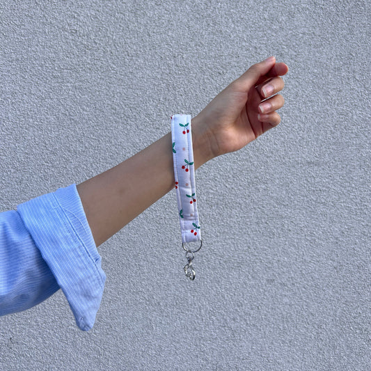 Cherry Heart Wristlet key holder worn around wrist with silver clasp